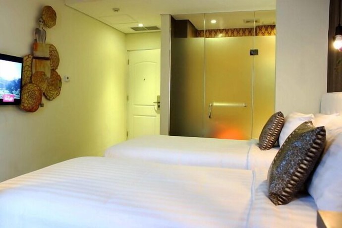 Imagen de la habitación del Hotel Couleur Jakarta. Foto 11