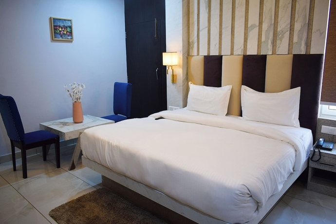 Imagen de la habitación del Hotel Country Ambience, Haldwani. Foto 6