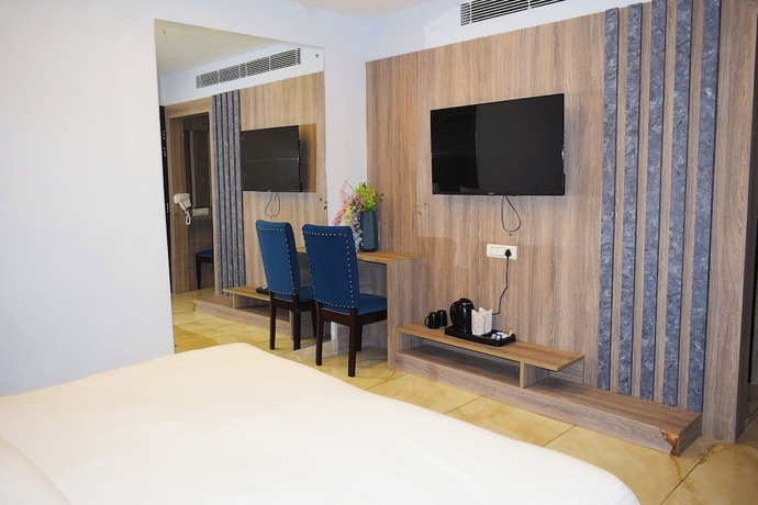 Imagen de la habitación del Hotel Country Ambience, Haldwani. Foto 7