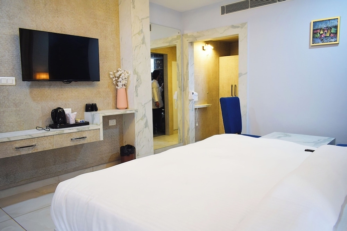 Imagen de la habitación del Hotel Country Ambience, Haldwani. Foto 10
