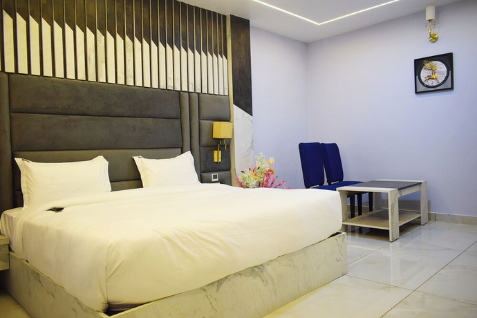 Imagen de la habitación del Hotel Country Ambience, Haldwani. Foto 11
