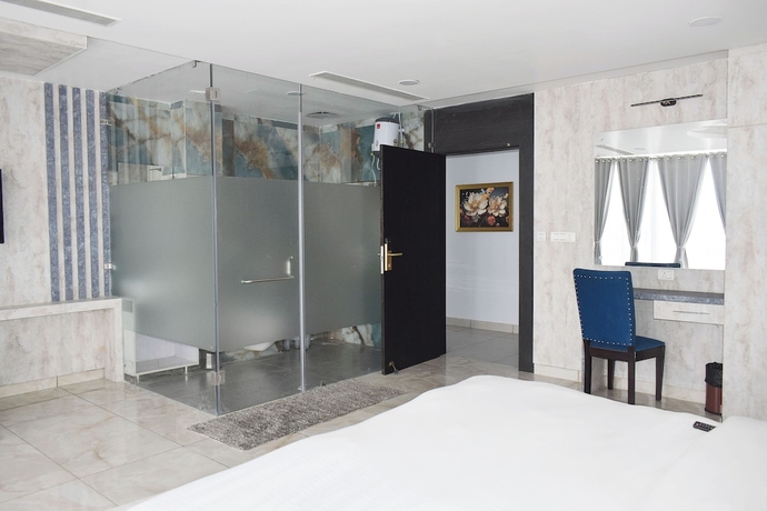 Imagen de la habitación del Hotel Country Ambience, Haldwani. Foto 14