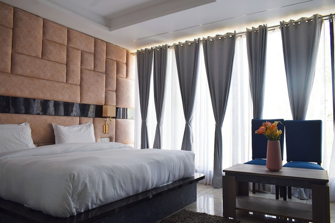 Imagen de la habitación del Hotel Country Ambience, Haldwani. Foto 15