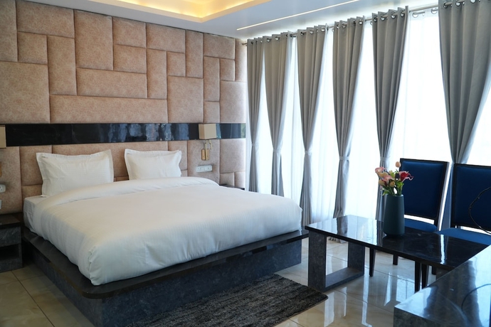 Imagen de la habitación del Hotel Country Ambience, Haldwani. Foto 7