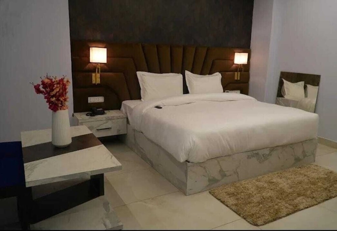 Imagen de la habitación del Hotel Country Ambience, Haldwani. Foto 8