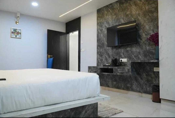 Imagen de la habitación del Hotel Country Ambience, Haldwani. Foto 9