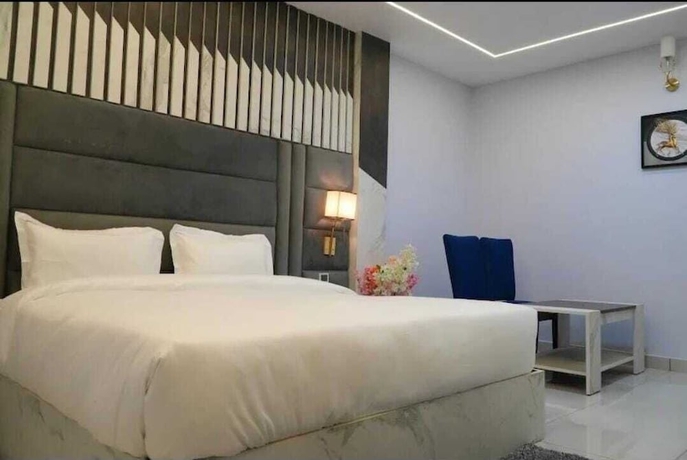 Imagen de la habitación del Hotel Country Ambience, Haldwani. Foto 10