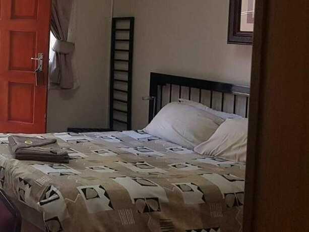 Imagen de la habitación del Hotel Country Blue Guest House. Foto 19