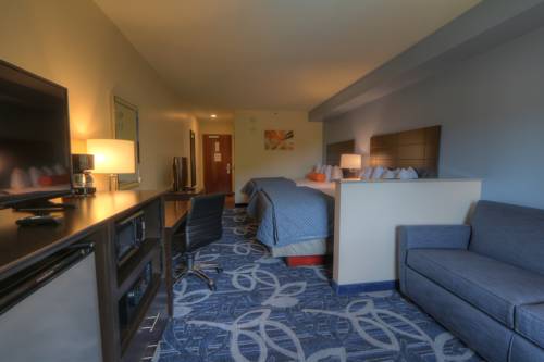Imagen de la habitación del Hotel Country Cascades Waterpark Resort. Foto 7