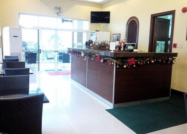 Imagen del bar/restaurante del Hotel Country Chateau. Foto 18