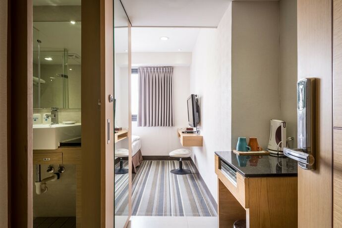 Imagen de la habitación del Hotel Country, Chiayi City. Foto 11