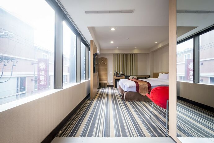 Imagen de la habitación del Hotel Country, Chiayi City. Foto 12