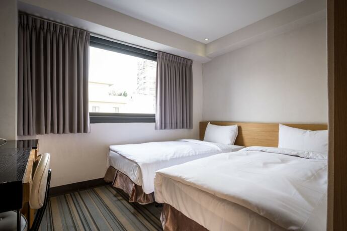 Imagen de la habitación del Hotel Country, Chiayi City. Foto 13