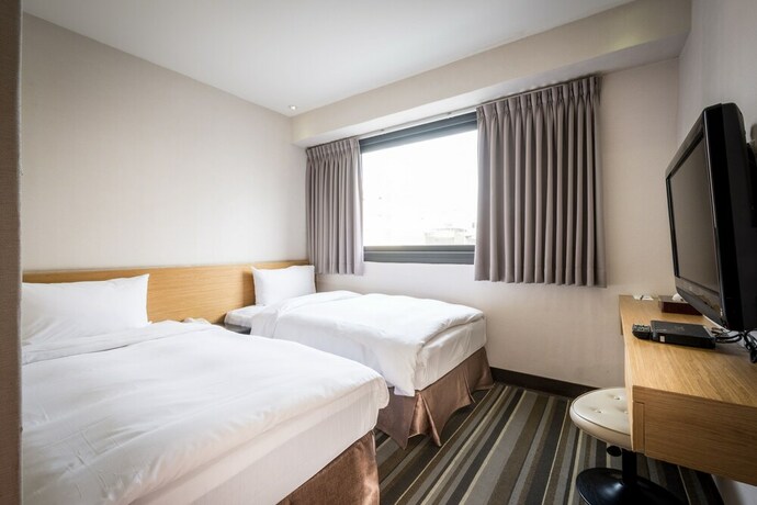 Imagen de la habitación del Hotel Country, Chiayi City. Foto 14