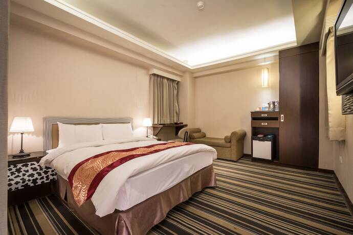 Imagen de la habitación del Hotel Country, Chiayi City. Foto 21