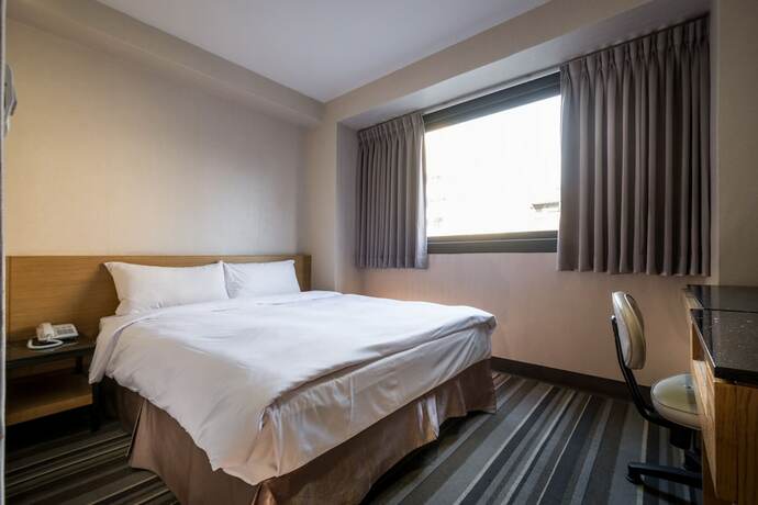 Imagen de la habitación del Hotel Country, Chiayi City. Foto 22