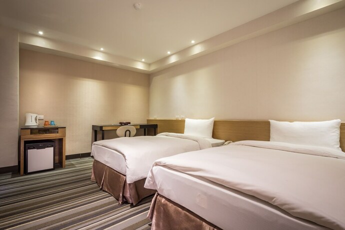 Imagen de la habitación del Hotel Country, Chiayi City. Foto 23