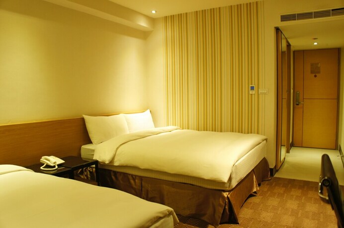 Imagen de la habitación del Hotel Country, Chiayi City. Foto 25