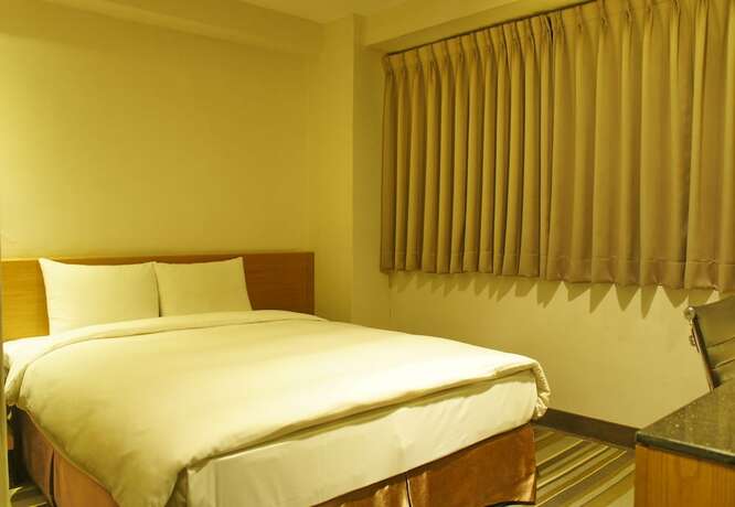 Imagen de la habitación del Hotel Country, Chiayi City. Foto 27