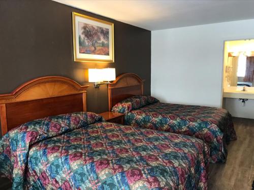 Imagen de la habitación del Hotel Country Club Inn & Suites. Foto 2