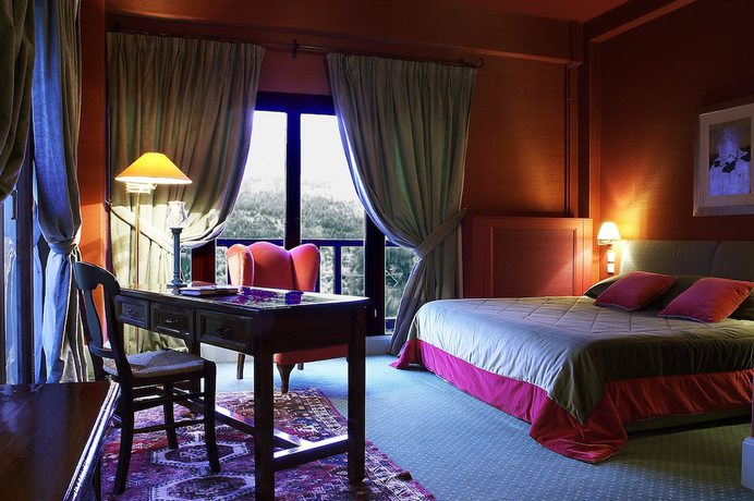 Imagen de la habitación del Hotel Country Club and Suites. Foto 15