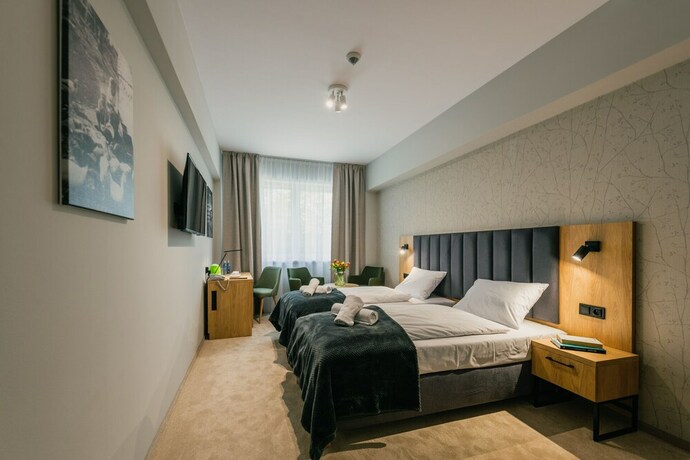 Imagen de la habitación del Hotel Country Club Żywiec i Domki Całoroczne. Foto 17