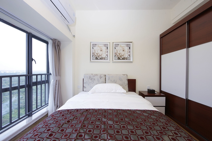 Imagen de la habitación del Hotel Country Garden Airport Kylin Apartment. Foto 6