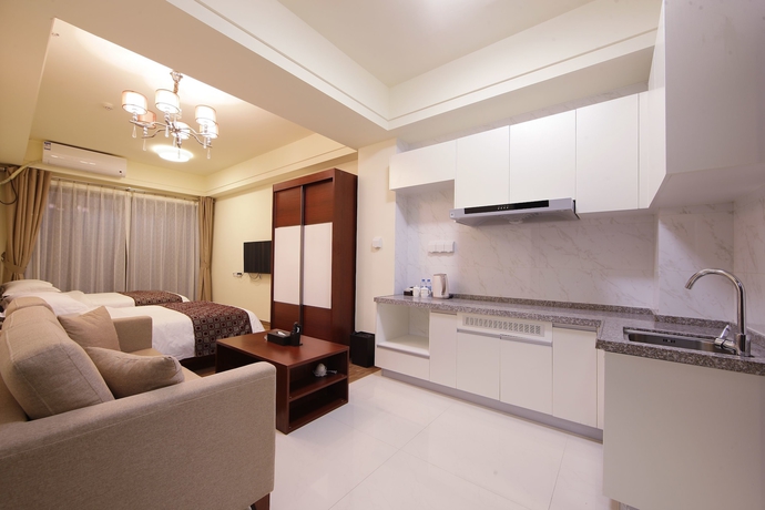 Imagen de la habitación del Hotel Country Garden Airport Kylin Apartment. Foto 9