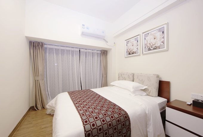 Imagen de la habitación del Hotel Country Garden Airport Kylin Apartment. Foto 10