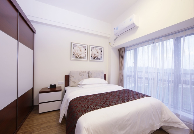 Imagen de la habitación del Hotel Country Garden Airport Kylin Apartment. Foto 11