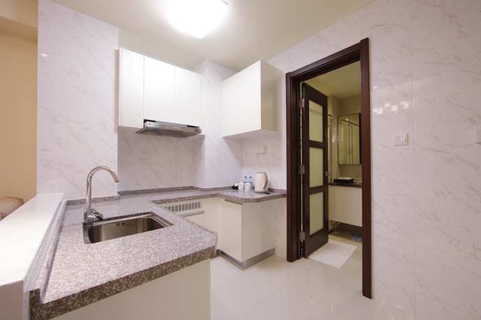 Imagen de la habitación del Hotel Country Garden Airport Kylin Apartment. Foto 14
