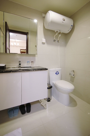 Imagen de la habitación del Hotel Country Garden Airport Kylin Apartment. Foto 15
