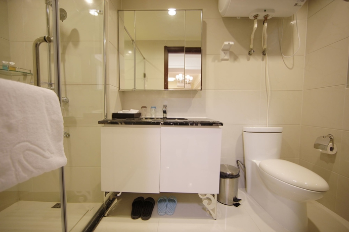 Imagen de la habitación del Hotel Country Garden Airport Kylin Apartment. Foto 16