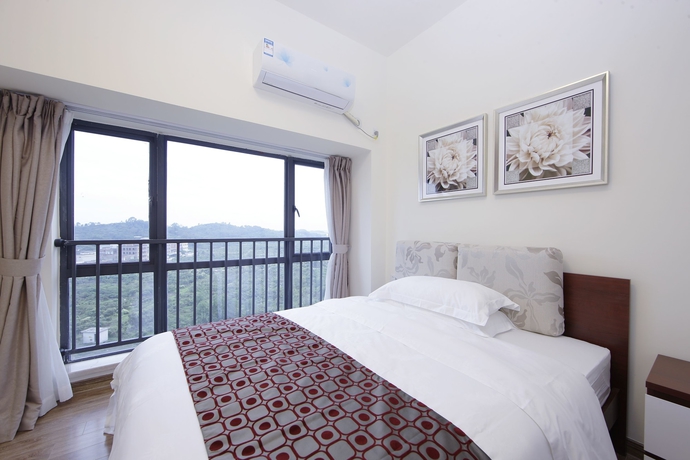 Imagen de la habitación del Hotel Country Garden Airport Kylin Apartment. Foto 19