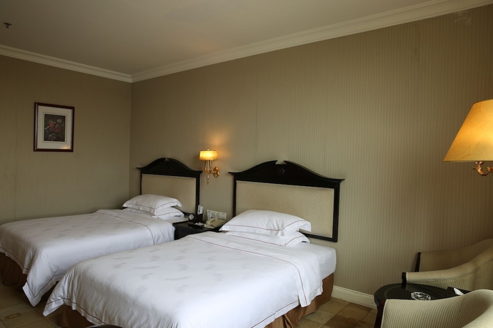 Imagen de la habitación del Hotel Country Garden Flower City. Foto 2
