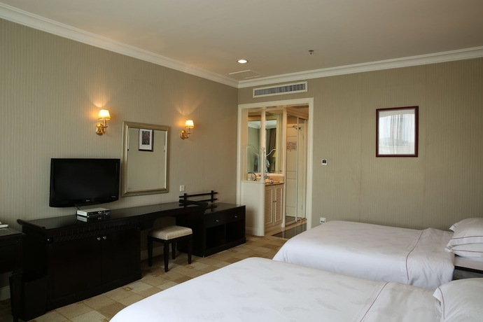 Imagen de la habitación del Hotel Country Garden Flower City. Foto 4