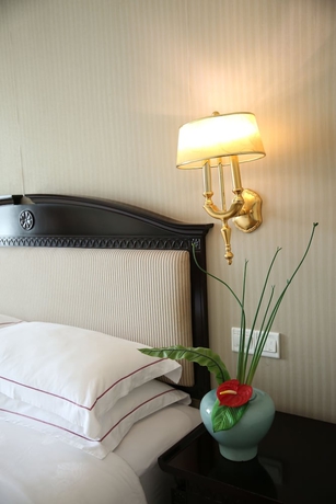 Imagen de la habitación del Hotel Country Garden Flower City. Foto 11
