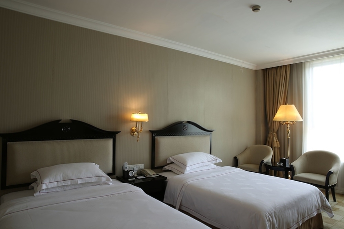 Imagen de la habitación del Hotel Country Garden Flower City. Foto 13