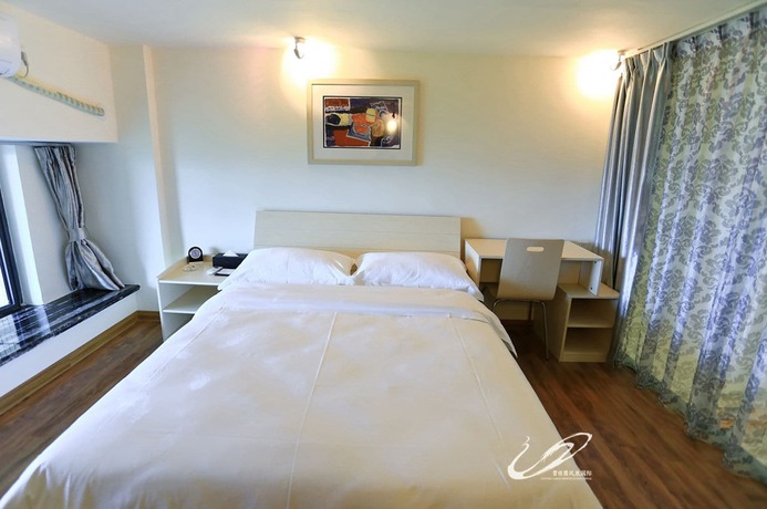 Imagen de la habitación del Hotel Country Garden Holiday Hot Spring Fogang. Foto 7