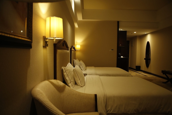 Imagen de la habitación del Hotel Country Garden Phoenix Binhu City. Foto 12