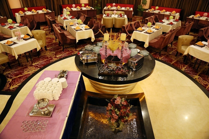 Imagen del bar/restaurante del Hotel Country Garden Phoenix Tianjin. Foto 2