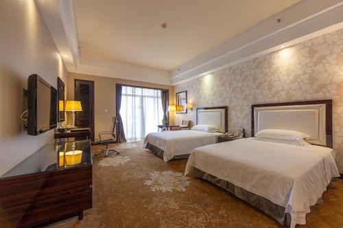 Imagen de la habitación del Hotel Country Garden Phoenix Yunfu. Foto 4
