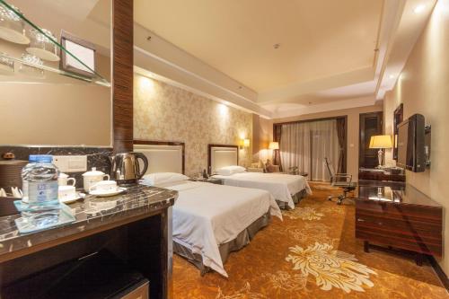 Imagen de la habitación del Hotel Country Garden Phoenix Yunfu. Foto 7