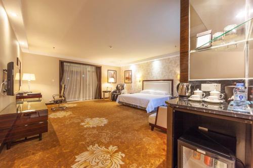Imagen de la habitación del Hotel Country Garden Phoenix Yunfu. Foto 8