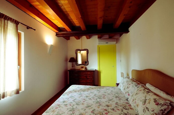 Imagen de la habitación del Hotel Country House Due Fiumi. Foto 2