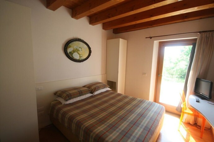 Imagen de la habitación del Hotel Country House Due Fiumi. Foto 4
