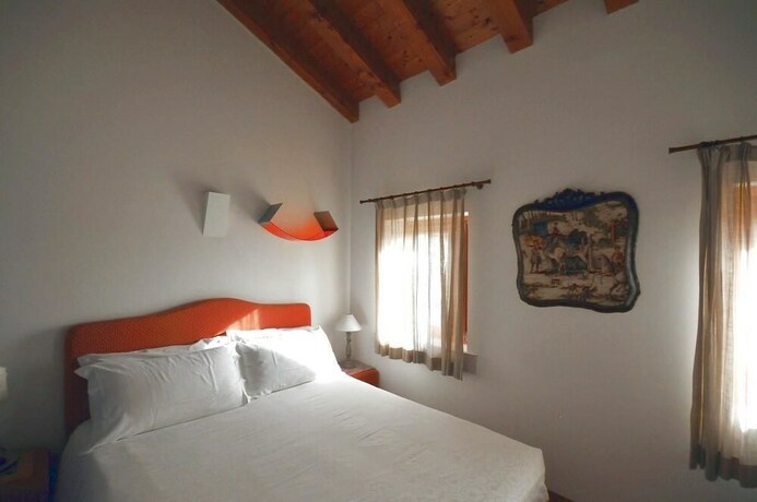 Imagen de la habitación del Hotel Country House Due Fiumi. Foto 5