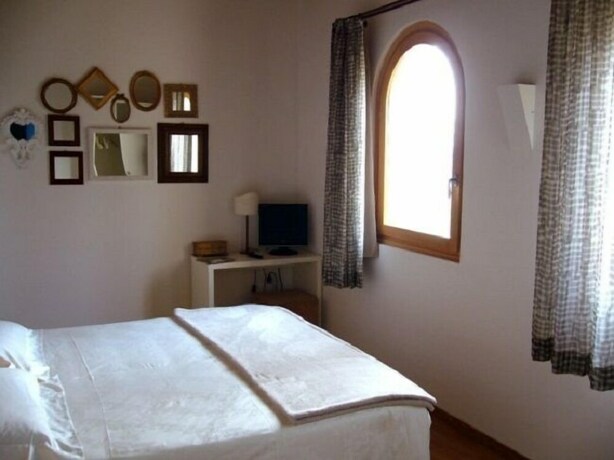 Imagen de la habitación del Hotel Country House Due Fiumi. Foto 10