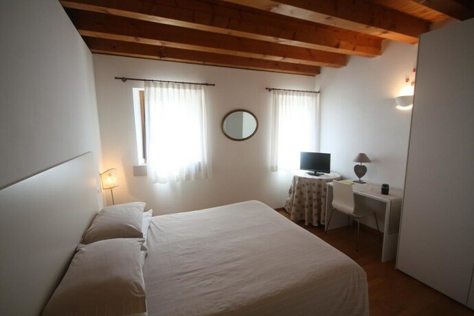 Imagen de la habitación del Hotel Country House Due Fiumi. Foto 11