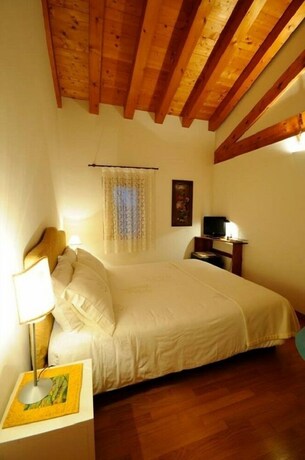 Imagen de la habitación del Hotel Country House Due Fiumi. Foto 14